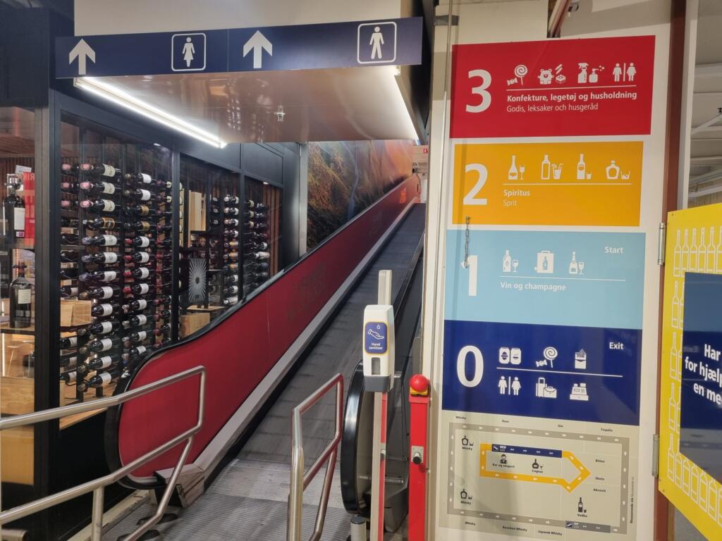 Floor directory and escalator in the BorderShop in Puttgarden