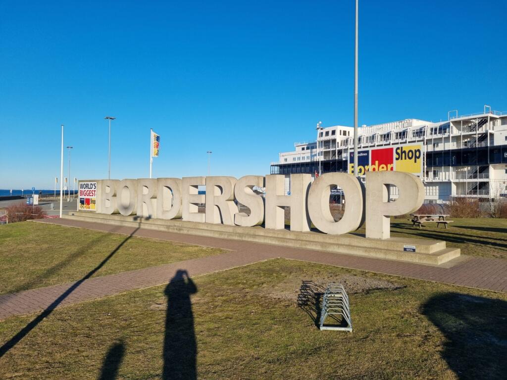 The big BorderShop letters with a Scandlines ferry behind them