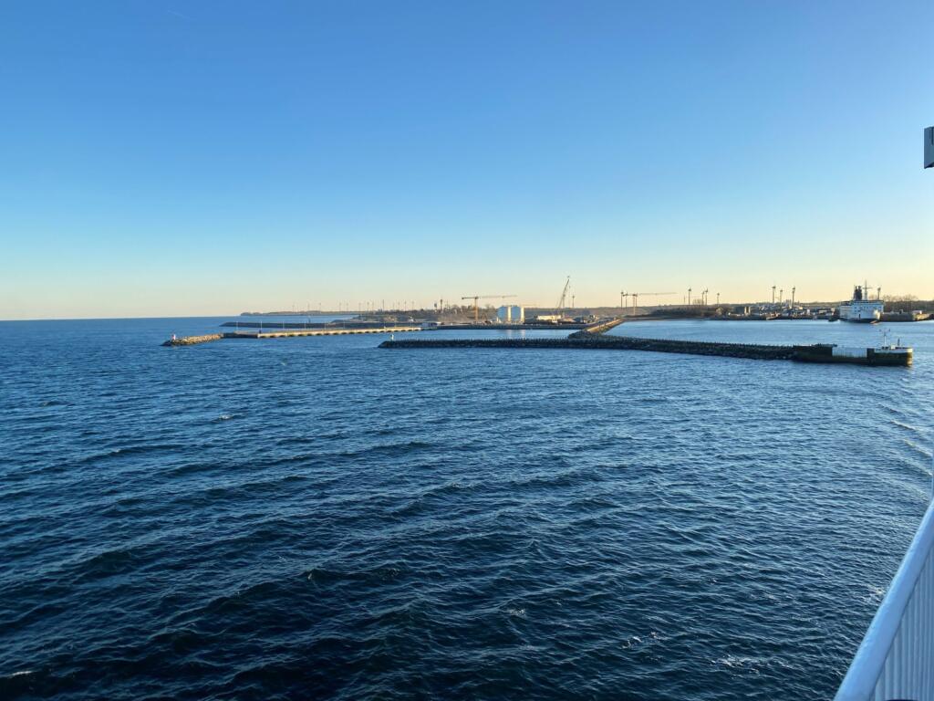 Breakwater and cranes along the Fehmarnbelt seen from the ferry