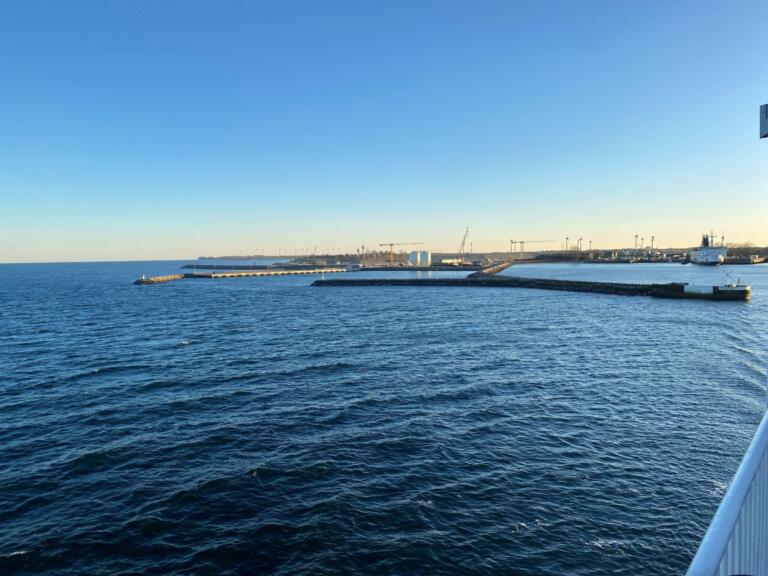 Breakwater and cranes along the Fehmarnbelt seen from the ferry